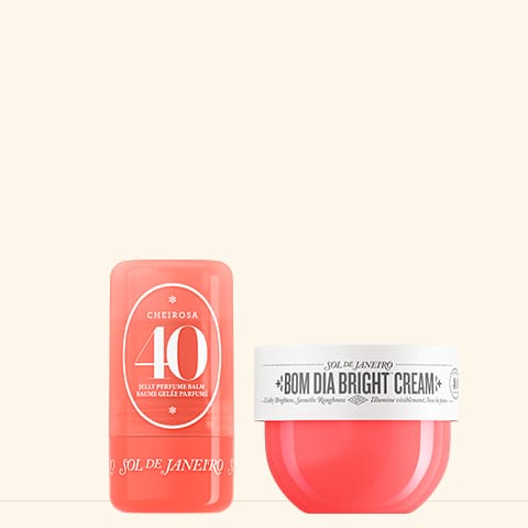 Two pink skincare products with labels on a white background